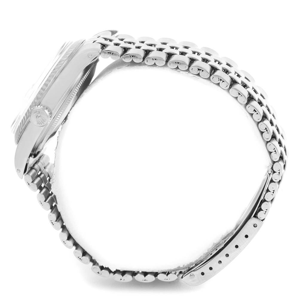 The image shows a side profile of a Rolex Vintage Collection 1603 Stainless Steel Silver Dial 1603 Stainless Steel Silver Dial watch, highlighting the case, crown, and band.