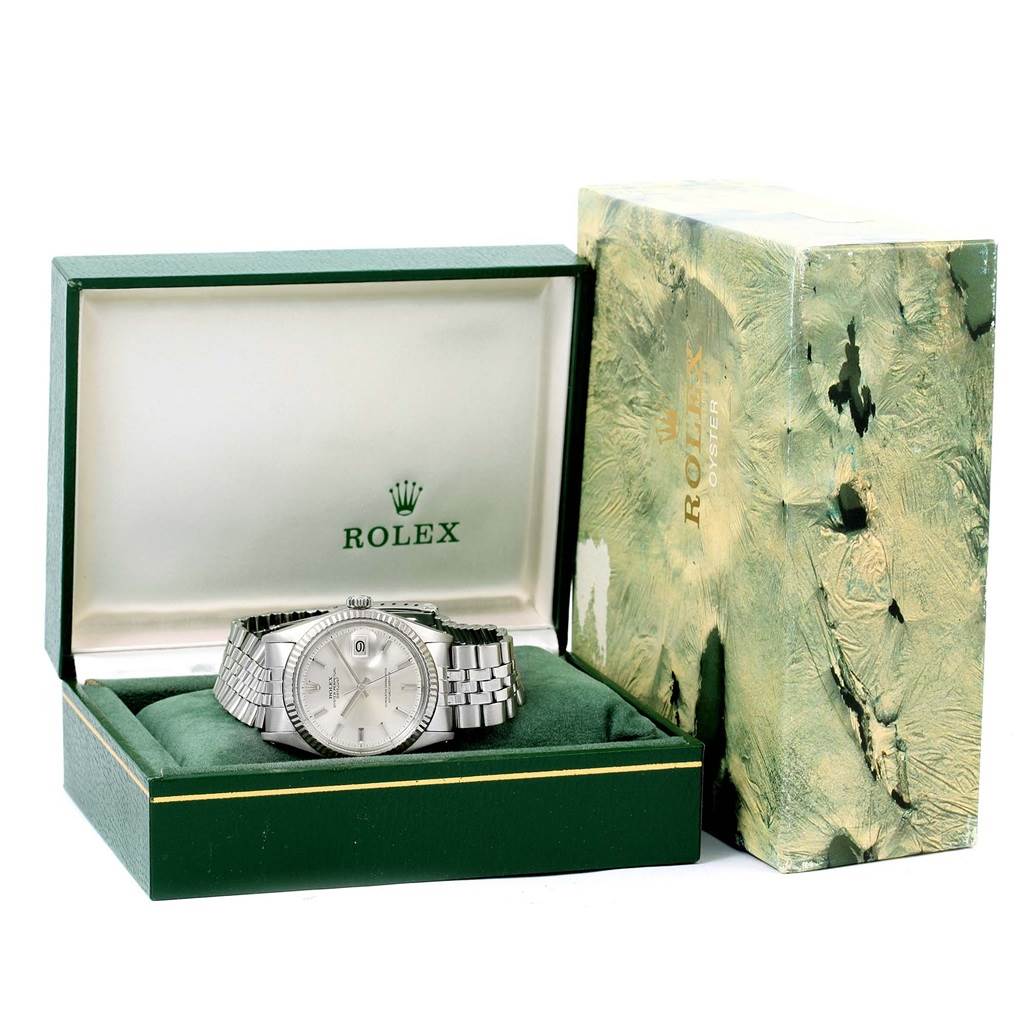 The image shows a Rolex Vintage Collection 1603 Stainless Steel Silver Dial 1603 Stainless Steel Silver Dial watch in its open box, with the packaging visible in the background.