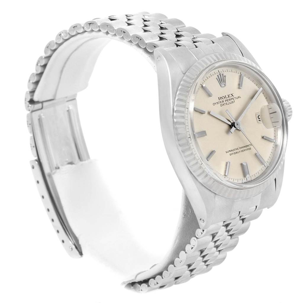 The image shows a Rolex Vintage Collection 1603 Stainless Steel Silver Dial 1603 Stainless Steel Silver Dial model watch from a side angle, highlighting its face, bezel, crown, and bracelet.