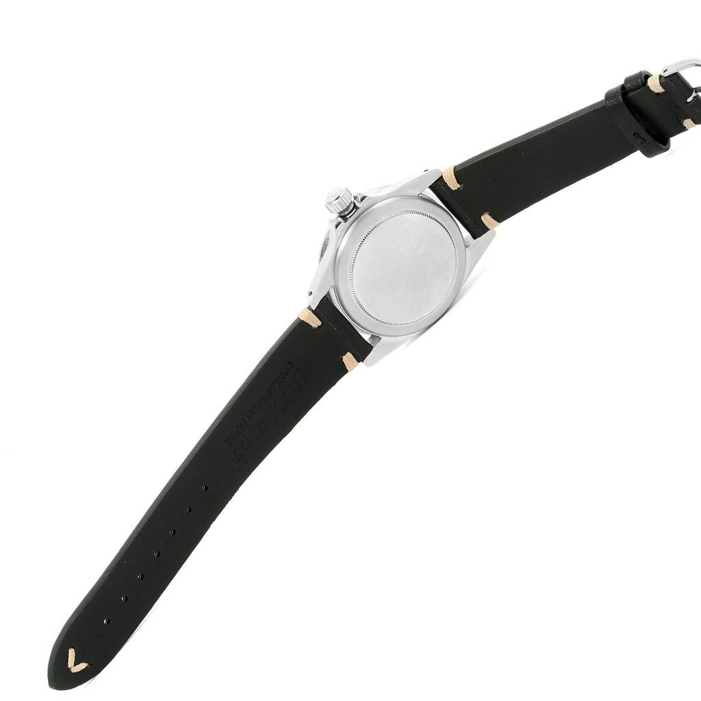 The image shows the back case and black leather strap of a Rolex Vintage Collection 5513 Men's Stainless Steel Black Dial 5513 Men's Stainless Steel Black Dial model watch.