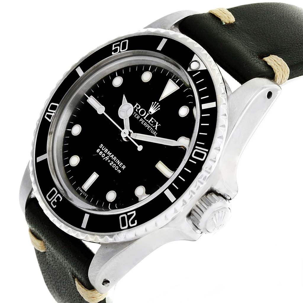 The image shows a Rolex Vintage Collection 5513 Men's Stainless Steel Black Dial 5513 Men's Stainless Steel Black Dial Submariner watch at an angled view, highlighting the dial, bezel, and leather strap.