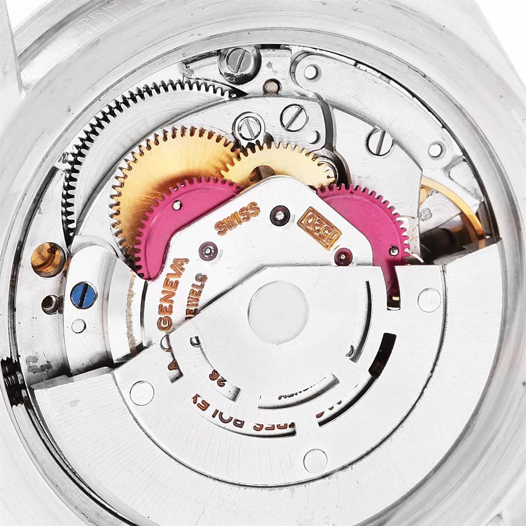 This image shows the exposed mechanical movement of the Vintage Collection Rolex watch.