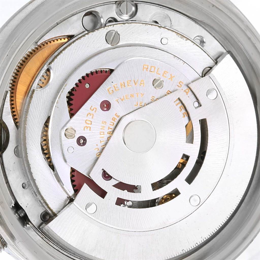 This image shows an angled view of the Rolex Vintage Collection 16030 Men's Stainless Steel Silver Dial 16030 Men's Stainless Steel Silver Dial watch's mechanical movement parts.