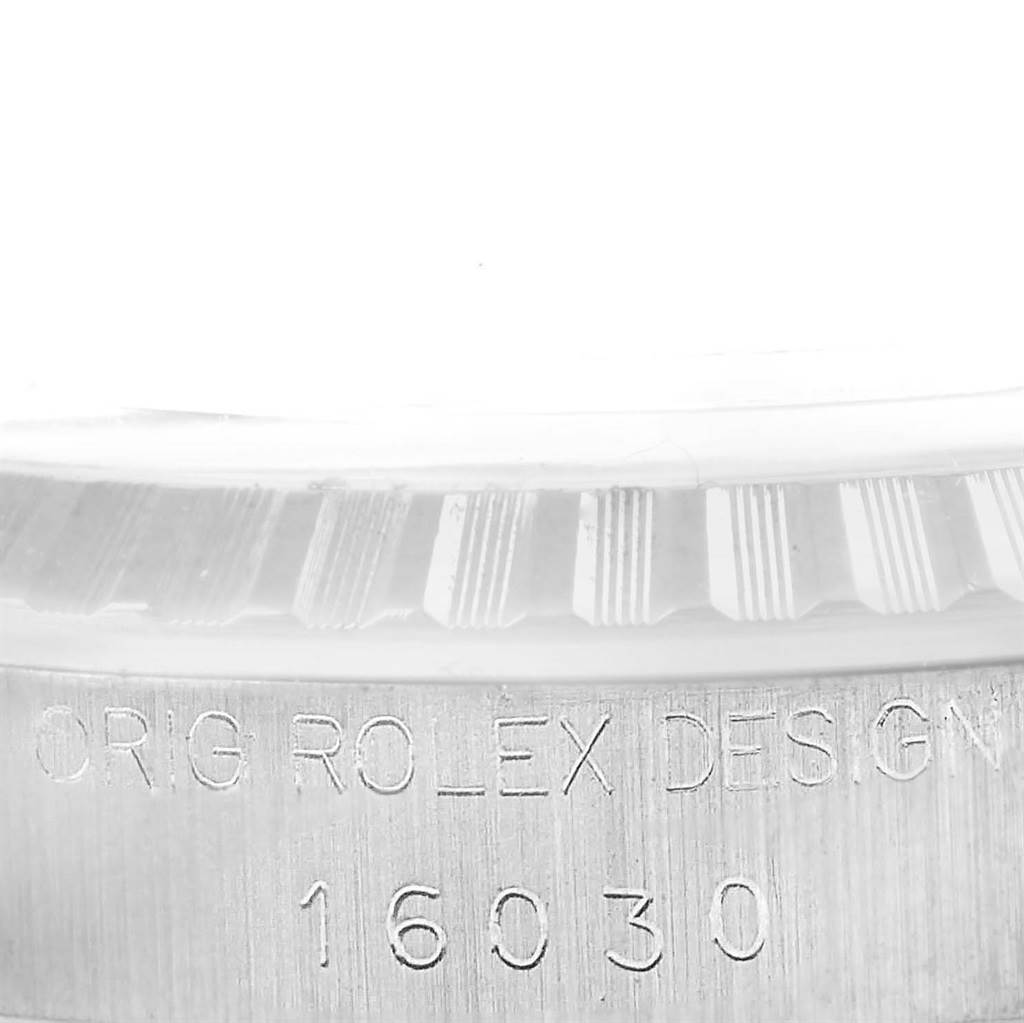 This image shows a close-up of the case’s edge and model number, 16030, of the Vintage Collection by Rolex.