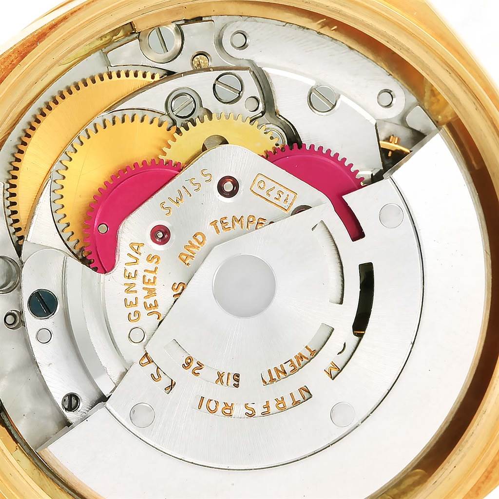 This image shows the internal gears and mechanism of a Rolex Vintage Collection 1601 Men's Yellow Gold Champagne Dial 1601 Men's Yellow Gold Champagne Dial model watch.