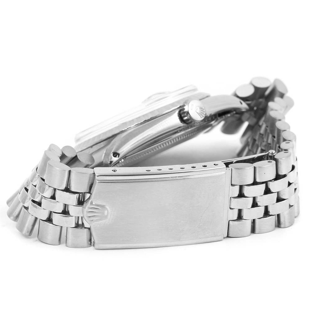 This image shows a side view of the Rolex Vintage Collection 1603 Men's Stainless Steel Silver Dial 1603 Men's Stainless Steel Silver Dial watch, focusing on the crown, case, and bracelet clasp.