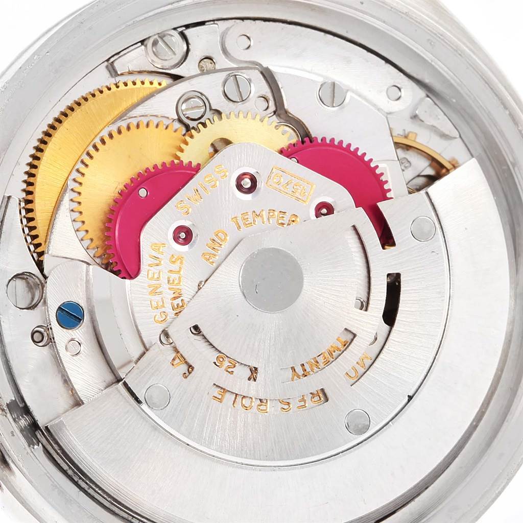 This image shows the internal mechanical components of a Rolex Vintage Collection 1603 Men's Stainless Steel Silver Dial 1603 Men's Stainless Steel Silver Dial model watch, focusing on gears and the rotor.