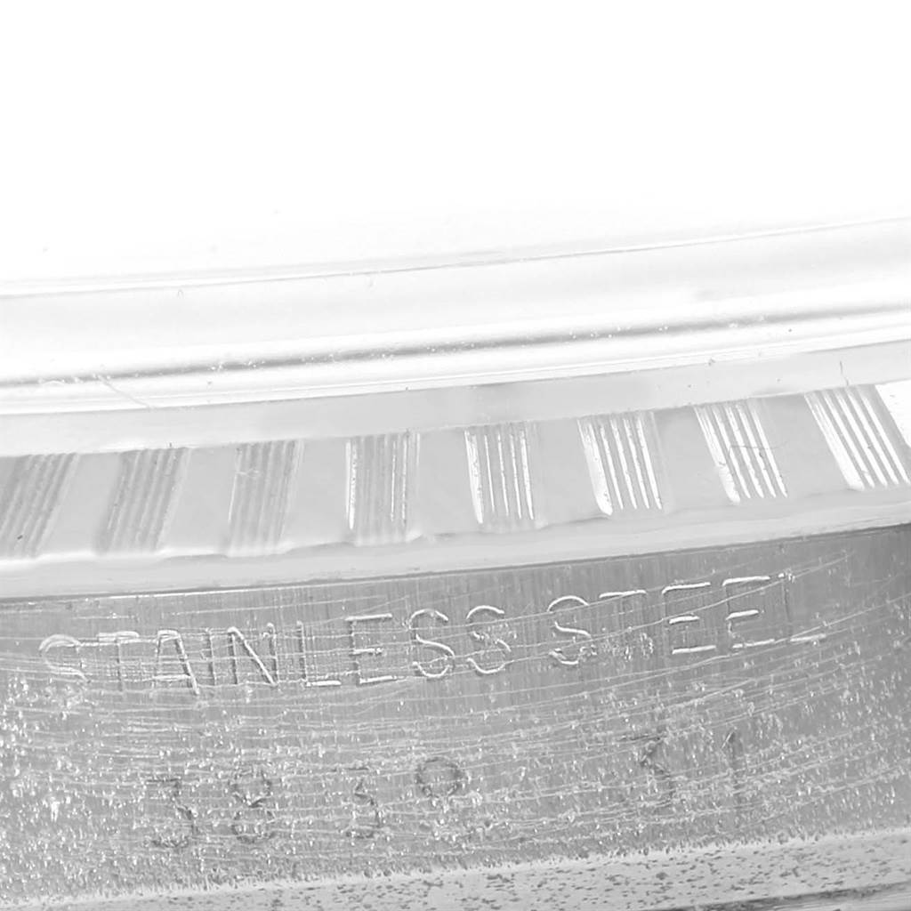 The image shows a close-up angle of the stainless steel case back of a Rolex Vintage Collection 1603 Men's Stainless Steel Silver Dial 1603 Men's Stainless Steel Silver Dial watch.