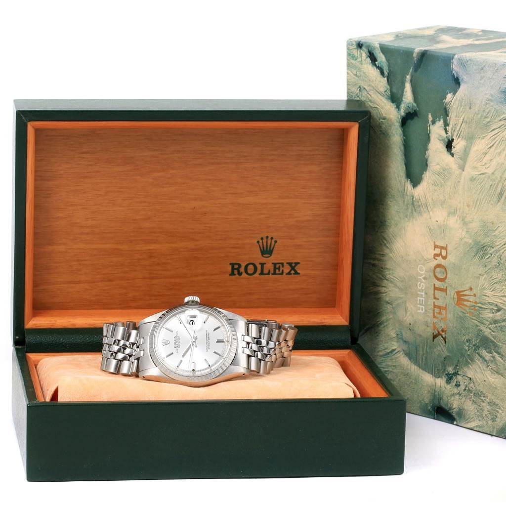 The Rolex Vintage Collection 1603 Men's Stainless Steel Silver Dial 1603 Men's Stainless Steel Silver Dial model is shown from the front, highlighting the watch face and bracelet inside its box.