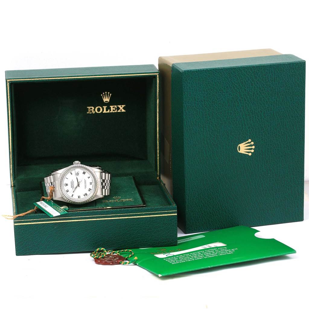 The Rolex Vintage Collection 16030 Men's Stainless Steel Silver Dial 16030 Men's Stainless Steel Silver Dial watch is shown from the front inside its green box, with tags and an outer box displayed.