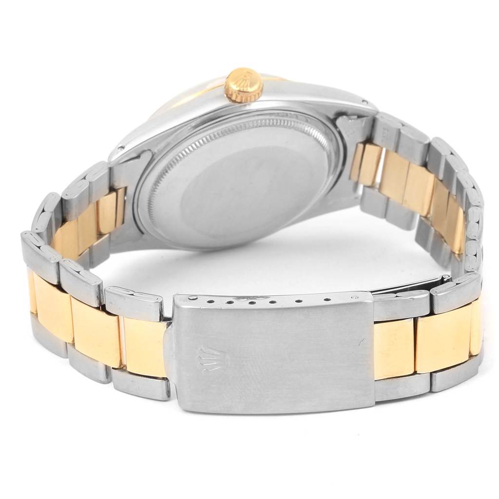 The image shows the back and clasp of the Rolex Vintage Collection 1601 Men's Stainless Steel Silver Dial 1601 Men's Stainless Steel Silver Dial watch, emphasizing the two-tone metal bracelet.