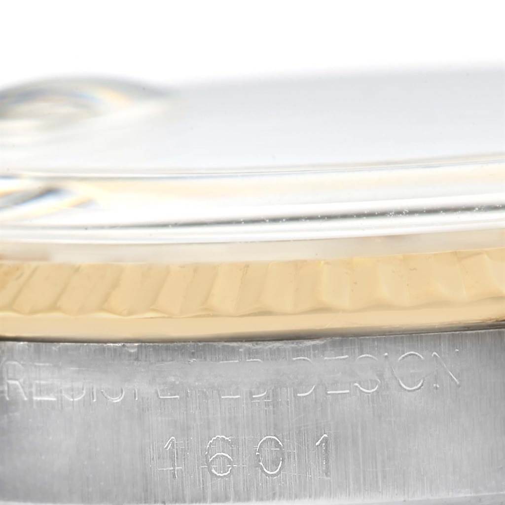 This image shows a close-up side view of the bezel and case of the Rolex Vintage Collection 1601 Men's Stainless Steel Silver Dial 1601 Men's Stainless Steel Silver Dial model.