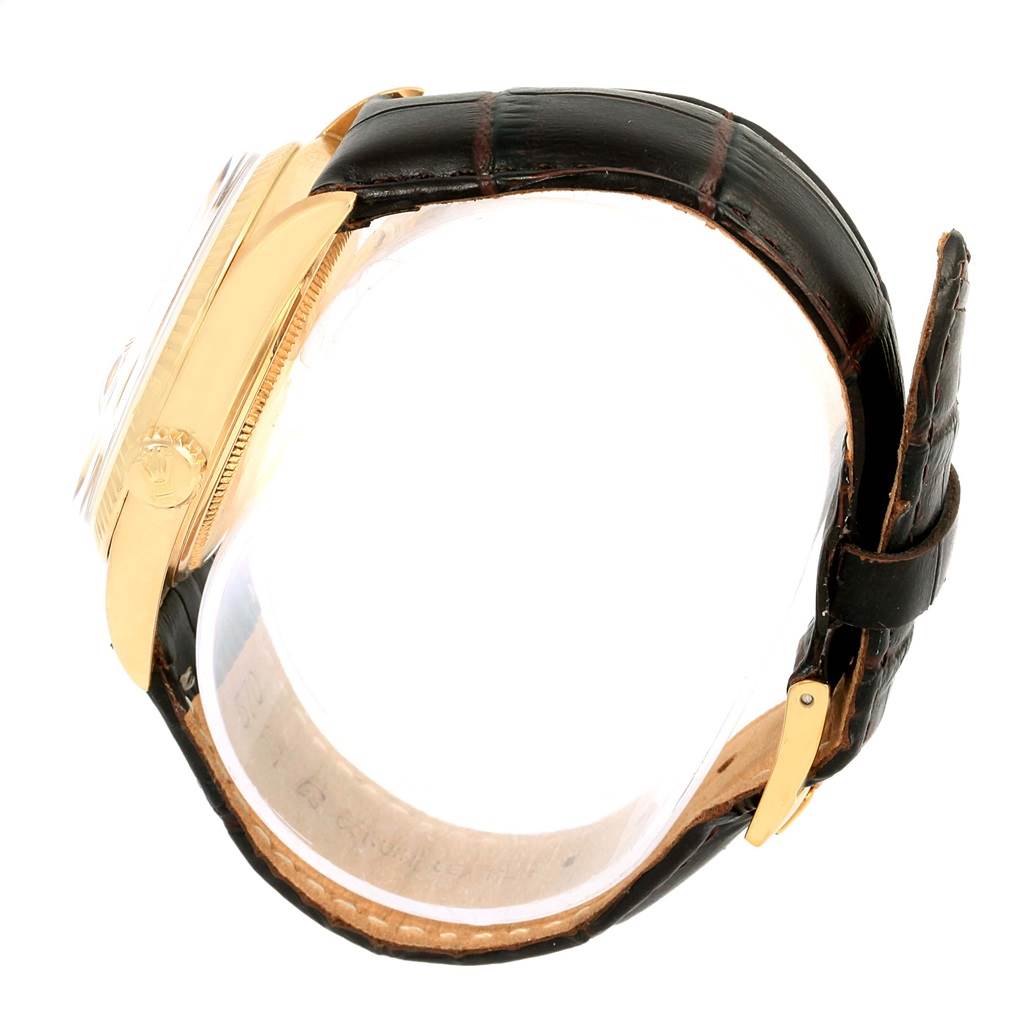 The image shows a side view of a Vintage Collection Rolex watch, highlighting the leather strap, clasp, and case.