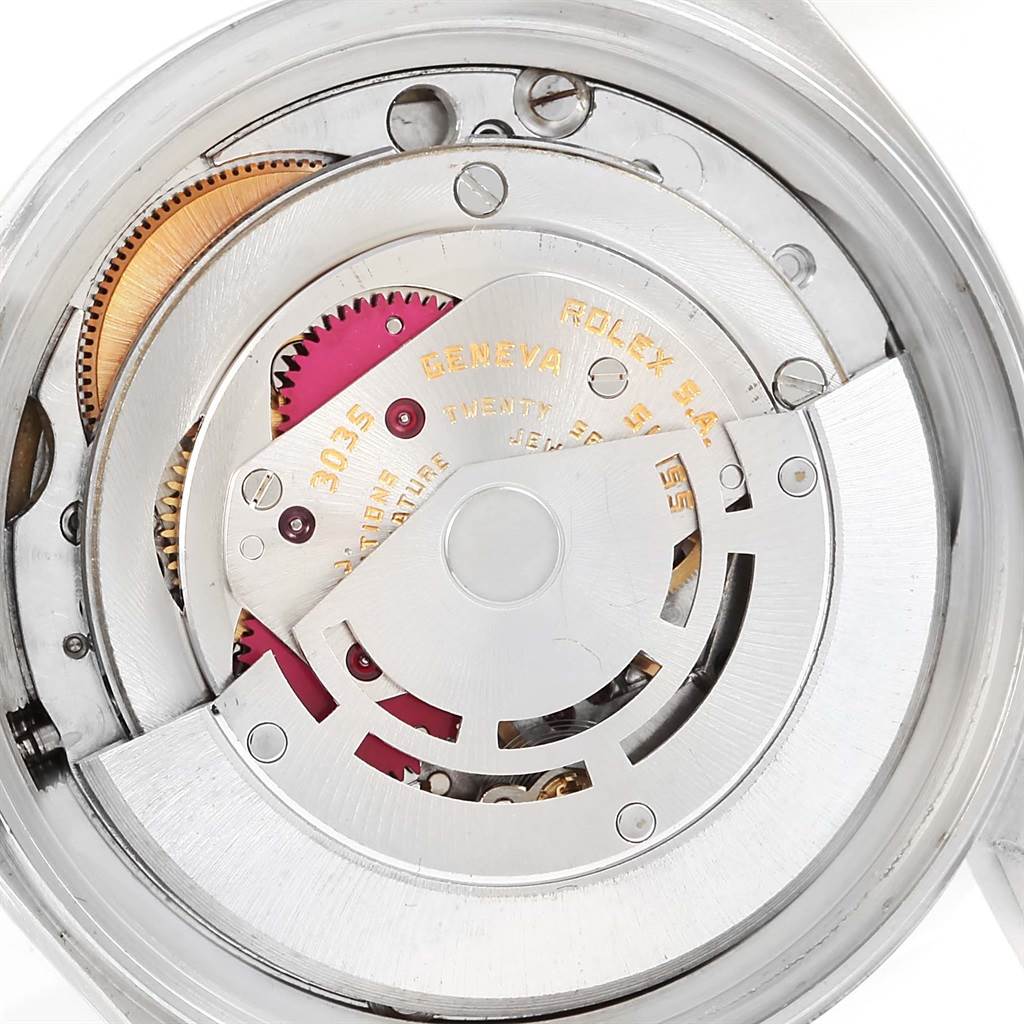 This image shows the internal movement mechanism of a Rolex Vintage Collection 16013 Men's Stainless Steel Champagne Dial 16013 Men's Stainless Steel Champagne Dial watch with visible gears and components.