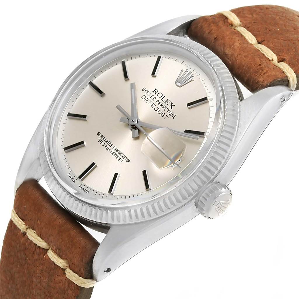 The Rolex Vintage Collection 16014 Men's Stainless Steel Silver Dial 16014 Men's Stainless Steel Silver Dial model is shown at an angle highlighting the face, bezel, crown, and part of the leather strap.
