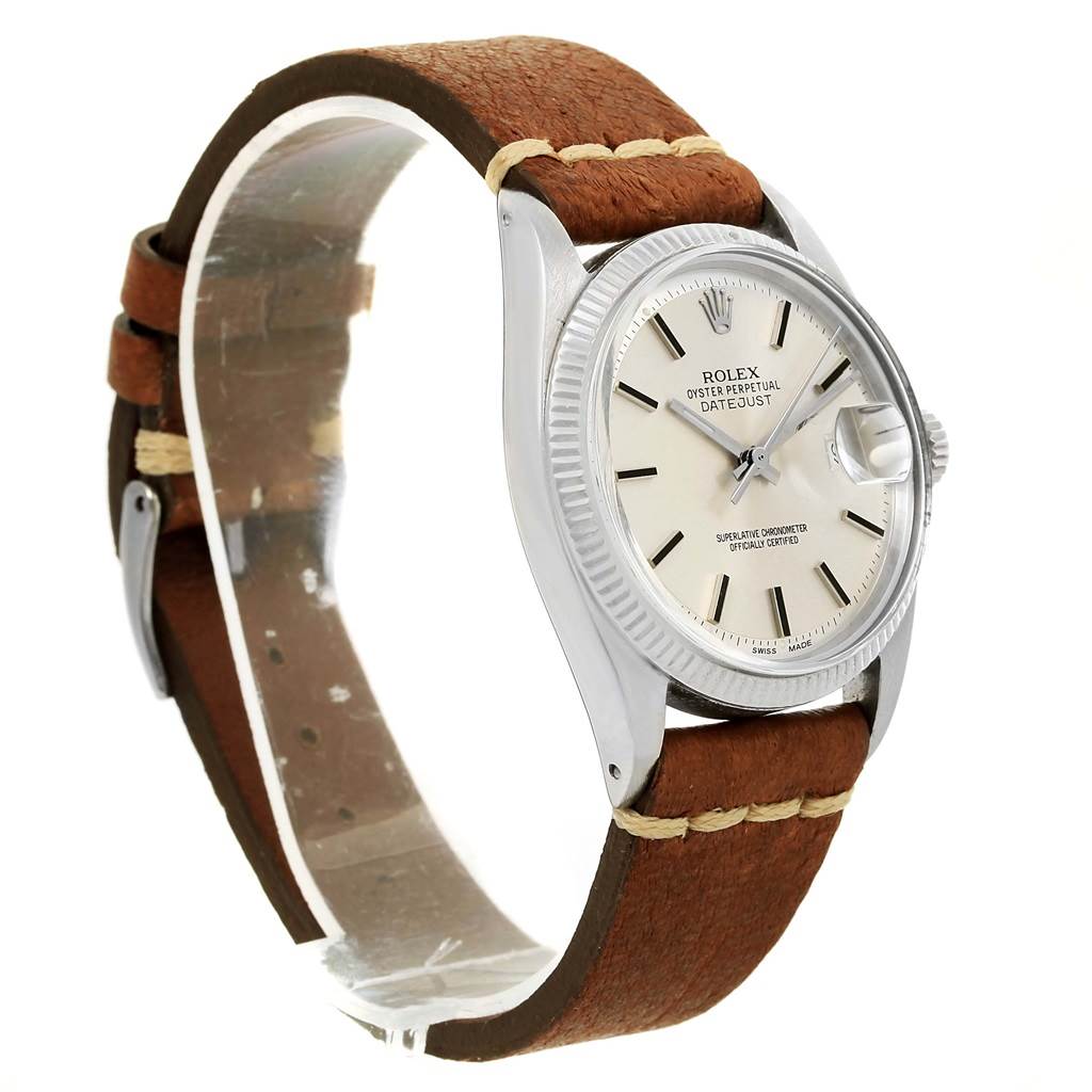 The image shows a side angle of a Vintage Collection Rolex Oyster Perpetual Datejust watch with a brown leather strap.