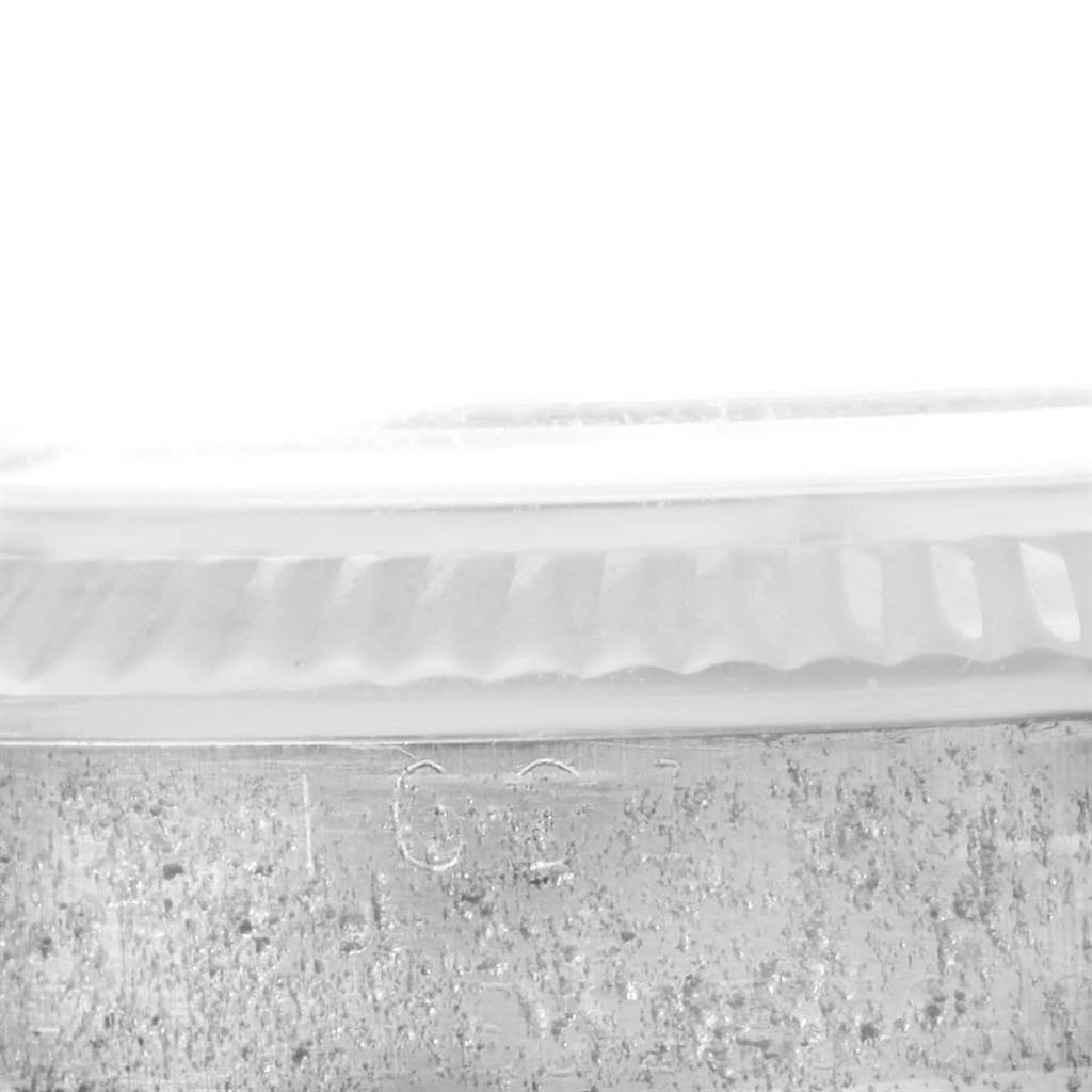 This image shows a close-up of the bezel and case side of the Rolex Vintage Collection 16014 Men's Stainless Steel Silver Dial 16014 Men's Stainless Steel Silver Dial model.