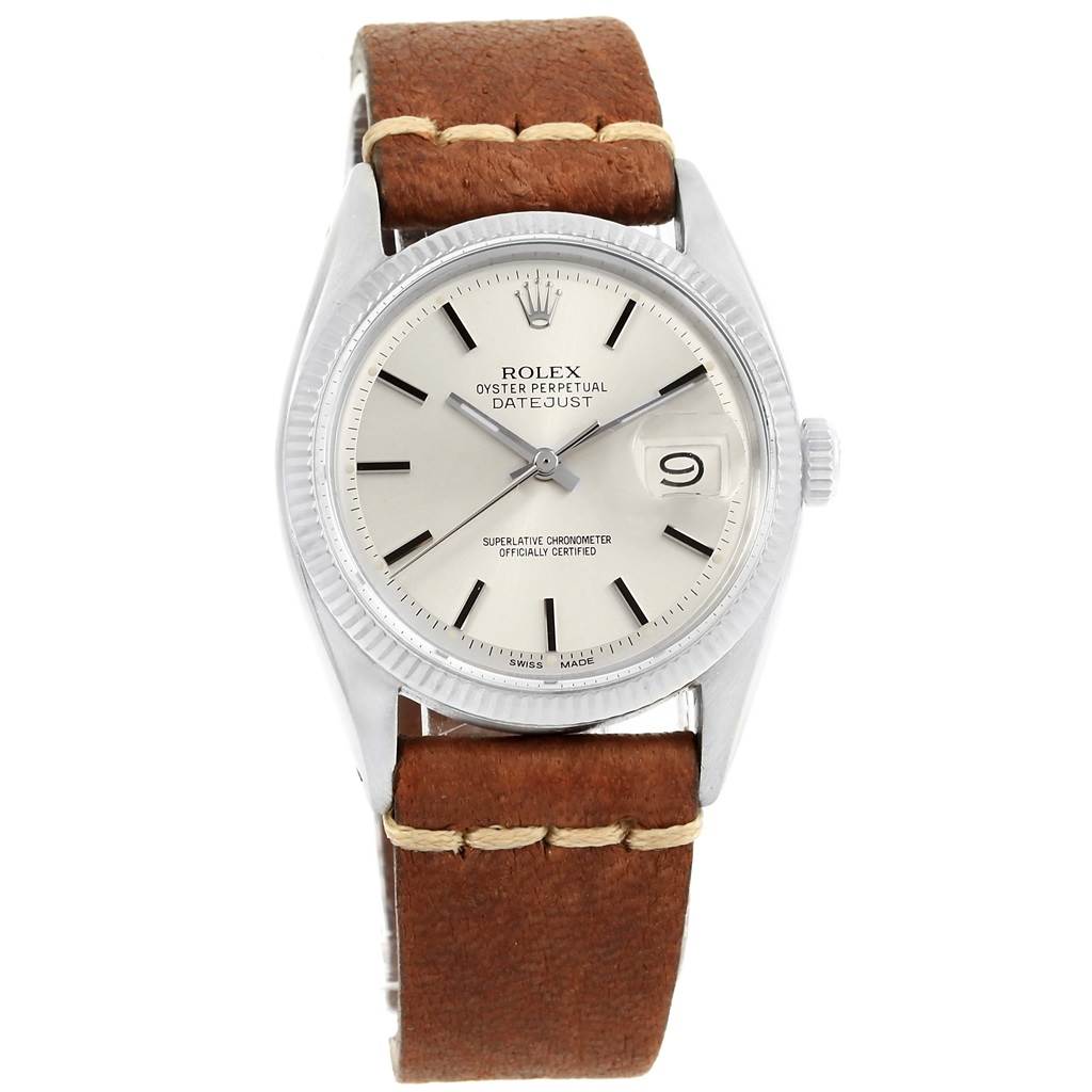 The image shows a front view of a Rolex Vintage Collection 16014 Men's Stainless Steel Silver Dial 16014 Men's Stainless Steel Silver Dial watch with a brown leather strap and a date display.