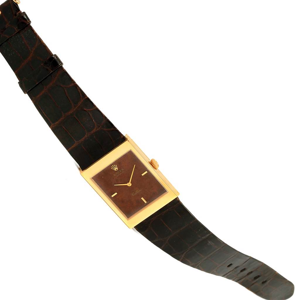 The image shows a front angle of a Rolex Vintage Collection 5071 Men's Yellow Gold Brown Dial 5071 Men's Yellow Gold Brown Dial watch with a rectangular gold case and a dark leather strap.