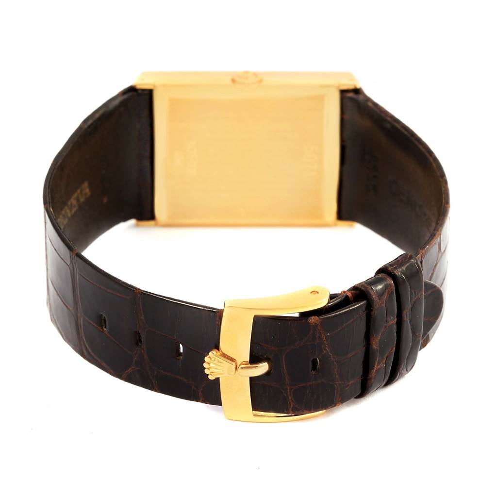 This image shows the backside and buckle of a Rolex Vintage Collection 5071 Men's Yellow Gold Brown Dial 5071 Men's Yellow Gold Brown Dial watch, highlighting its leather strap and gold clasp.