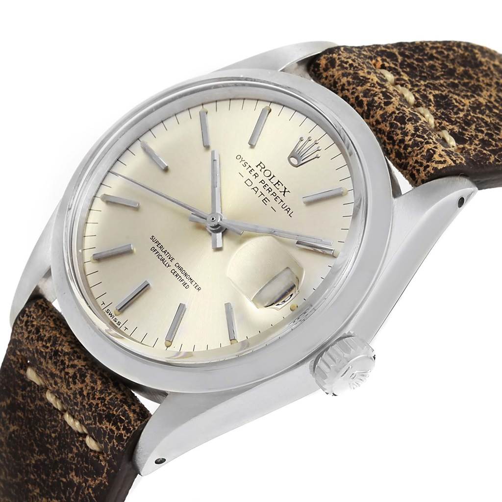 The image shows a Rolex Vintage Collection 1500 Men's Stainless Steel Silver Dial 1500 Men's Stainless Steel Silver Dial watch angled to display its dial, crown, and leather strap.