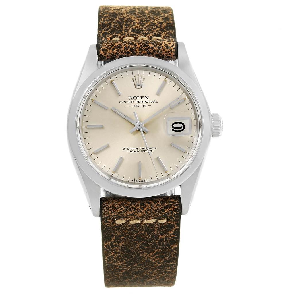 The image shows a front view of the Rolex Vintage Collection 1500 Men's Stainless Steel Silver Dial 1500 Men's Stainless Steel Silver Dial Oyster Perpetual Date watch with a brown leather strap.