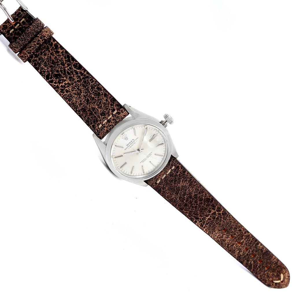 The Rolex Vintage Collection 1500 Men's Stainless Steel Silver Dial 1500 Men's Stainless Steel Silver Dial model watch is displayed face-up, showing the dial, case, crown, and entire brown leather strap.