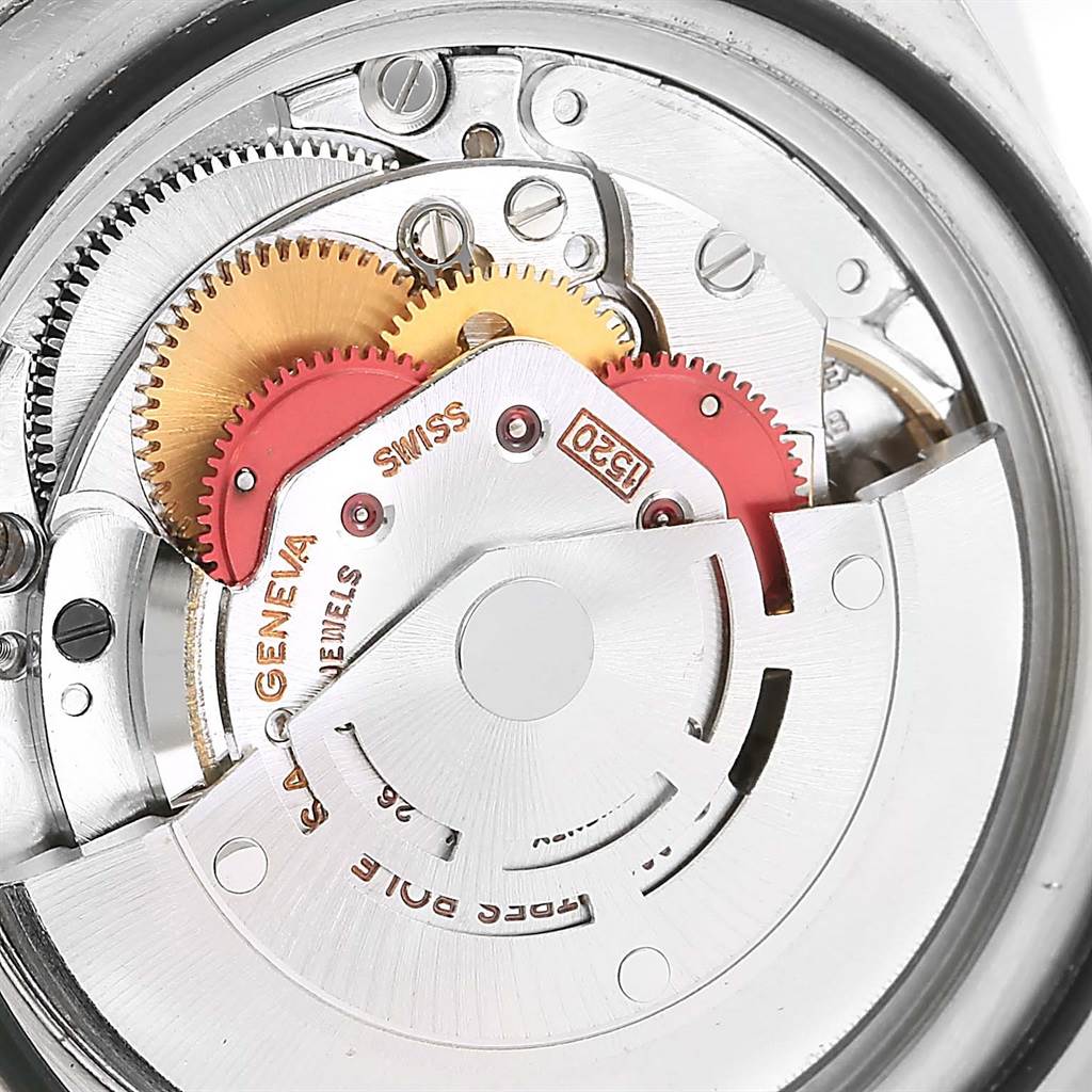 The image shows the movement mechanism of the Rolex Vintage Collection 5513 Men
s Stainless Steel Black Dial 5513 Men
s Stainless Steel Black Dial watch, highlighting its intricate gears and components.