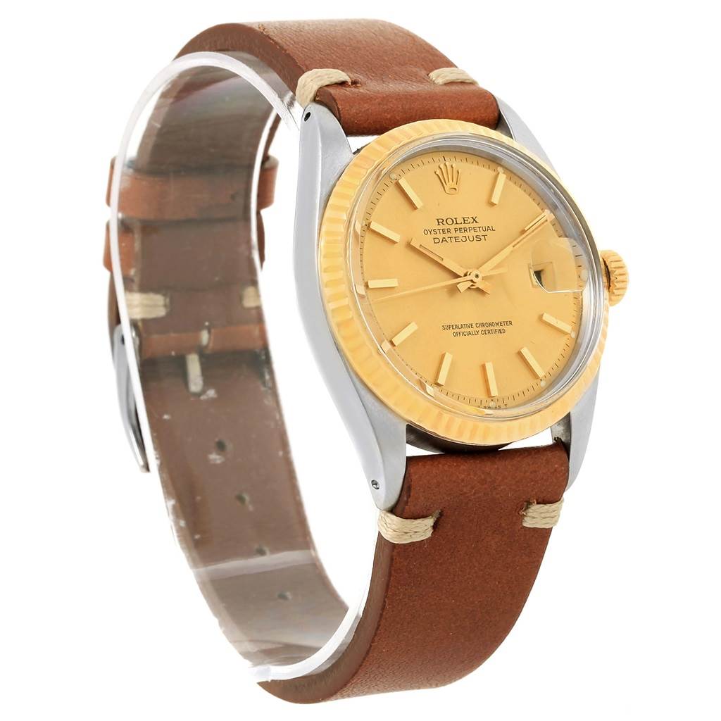 The Rolex Vintage Collection 1601 Men's Steel and Gold (two tone) Champagne Dial 1601 Men's Steel and Gold (two tone) Champagne Dial model is shown at a slight angle, displaying its face, bezel, crown, and leather strap.