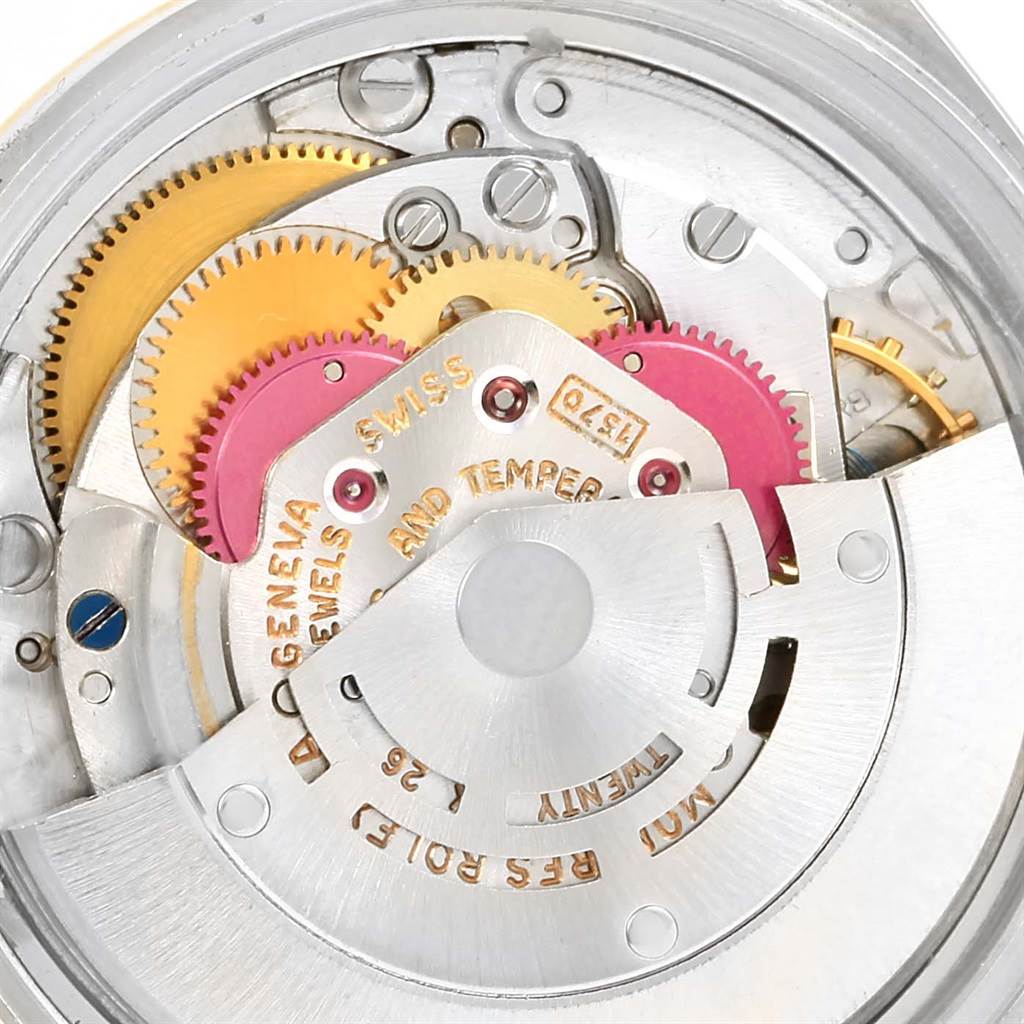 This close-up image shows the intricate inner movement of the Vintage Collection model by Rolex.