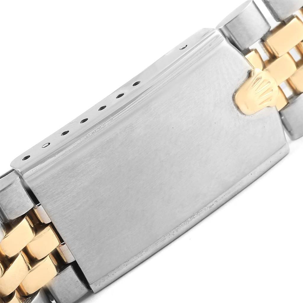 The image shows the clasp of a Rolex Vintage Collection 1601 Men's Steel and Gold (two tone) Grey Dial 1601 Men's Steel and Gold (two tone) Grey Dial watch, highlighting the metal finish and the Rolex crown logo.