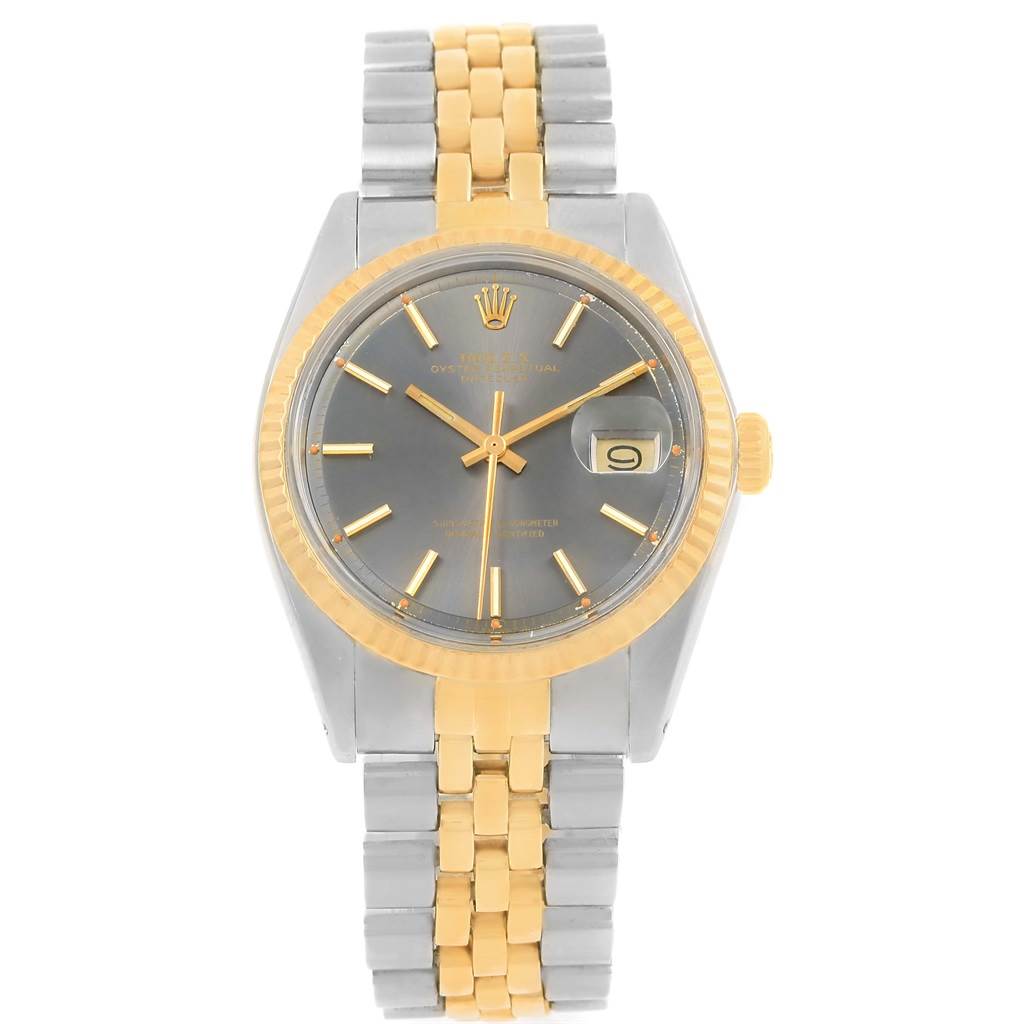 This image shows a front view of the Rolex Vintage Collection 1601 Men's Steel and Gold (two tone) Grey Dial 1601 Men's Steel and Gold (two tone) Grey Dial watch, displaying its grey dial, gold bezel, and two-tone bracelet.