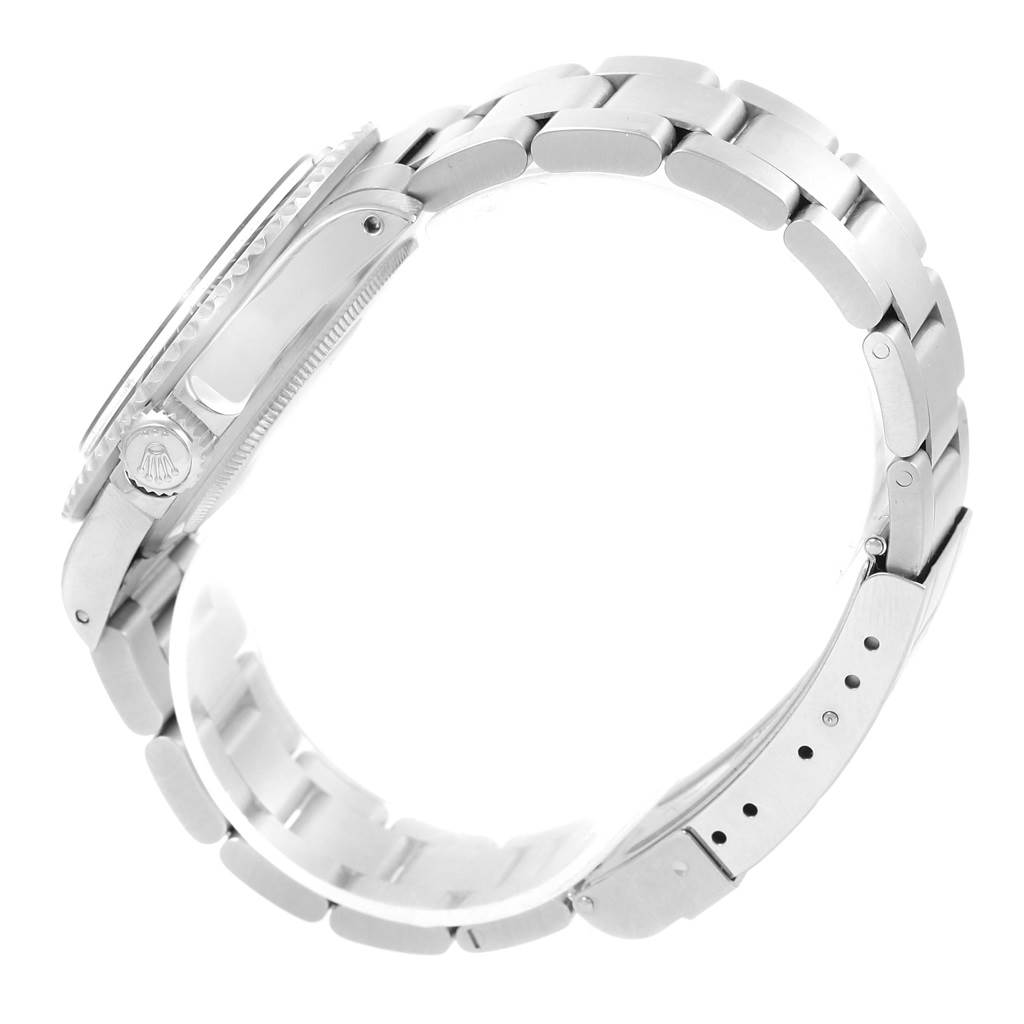 The Rolex Vintage Collection 5513 Men's Stainless Steel Black Dial 5513 Men's Stainless Steel Black Dial watch is shown from a side angle, highlighting the bracelet, crown, and partial case.