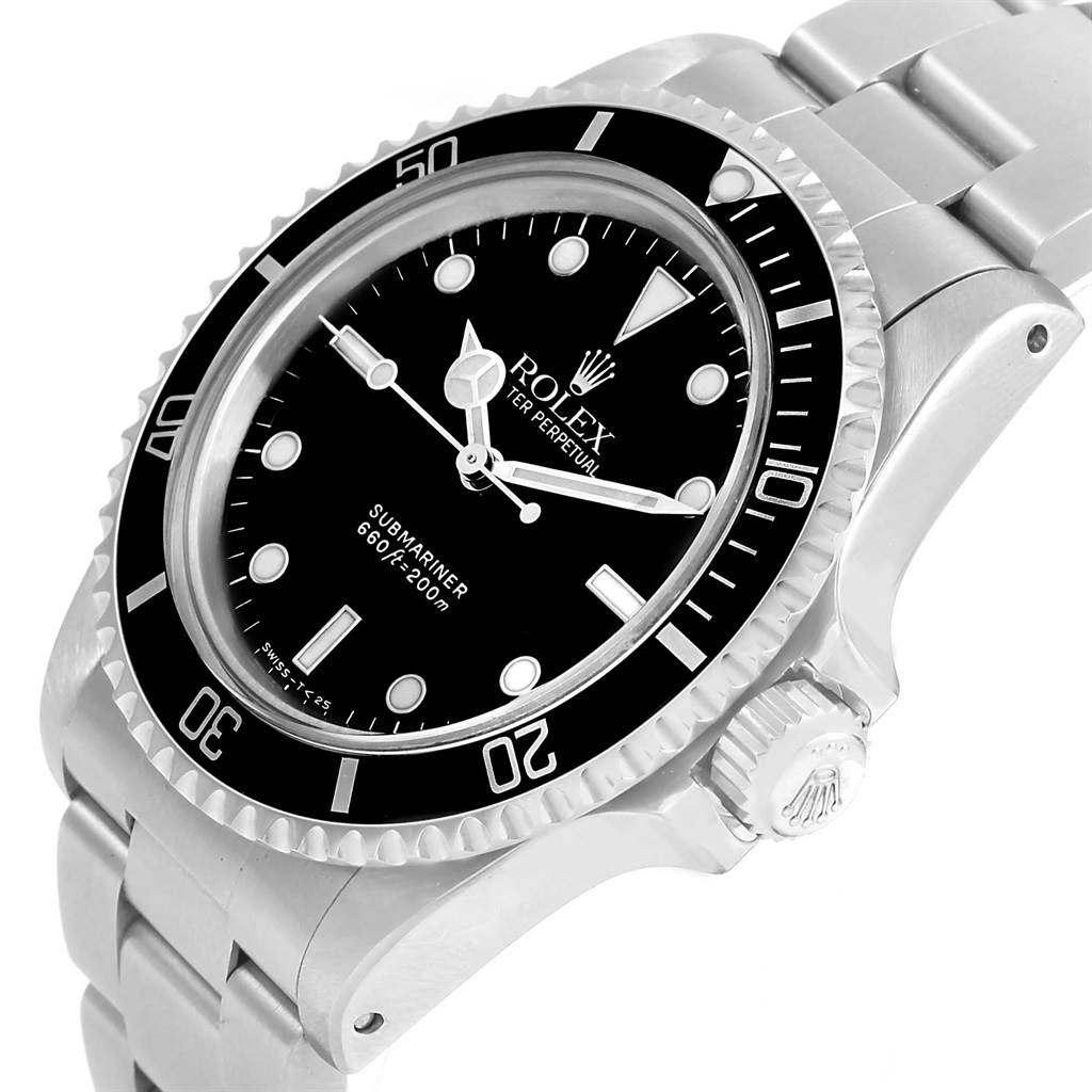 The image shows a Vintage Collection Rolex Submariner watch with a prominent bezel and crown at an angled close-up view.