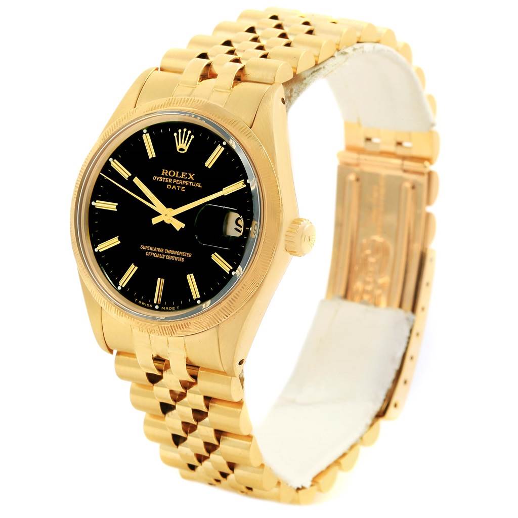The Rolex Vintage Collection 1513 Men's Yellow Gold Black Dial 1513 Men's Yellow Gold Black Dial watch is shown from a three-quarter angle, displaying its black dial, gold case, and metal bracelet.