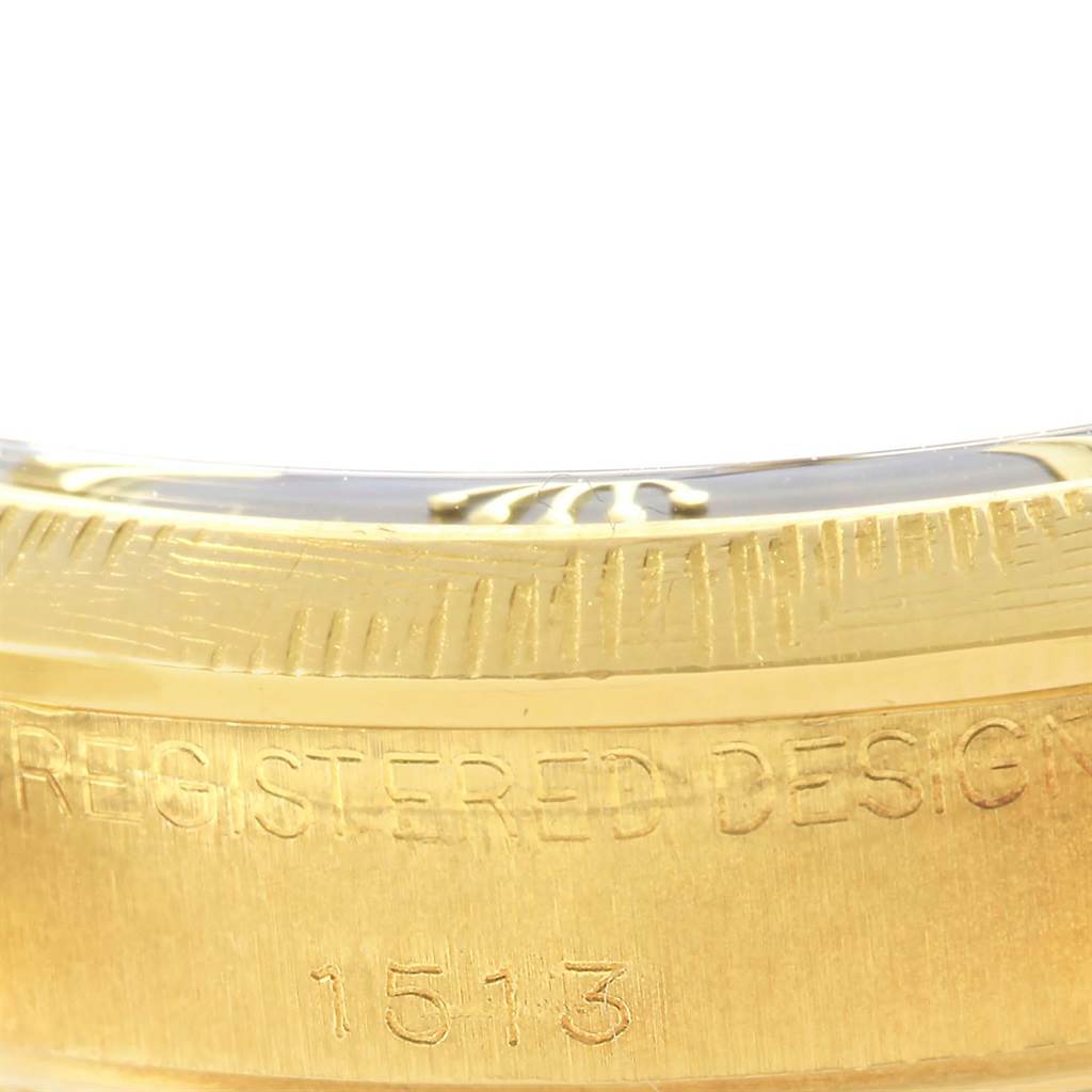 This image shows a close-up of the case side and engraved model number "1513" on the Rolex Vintage Collection 1513 Men's Yellow Gold Black Dial 1513 Men's Yellow Gold Black Dial watch.