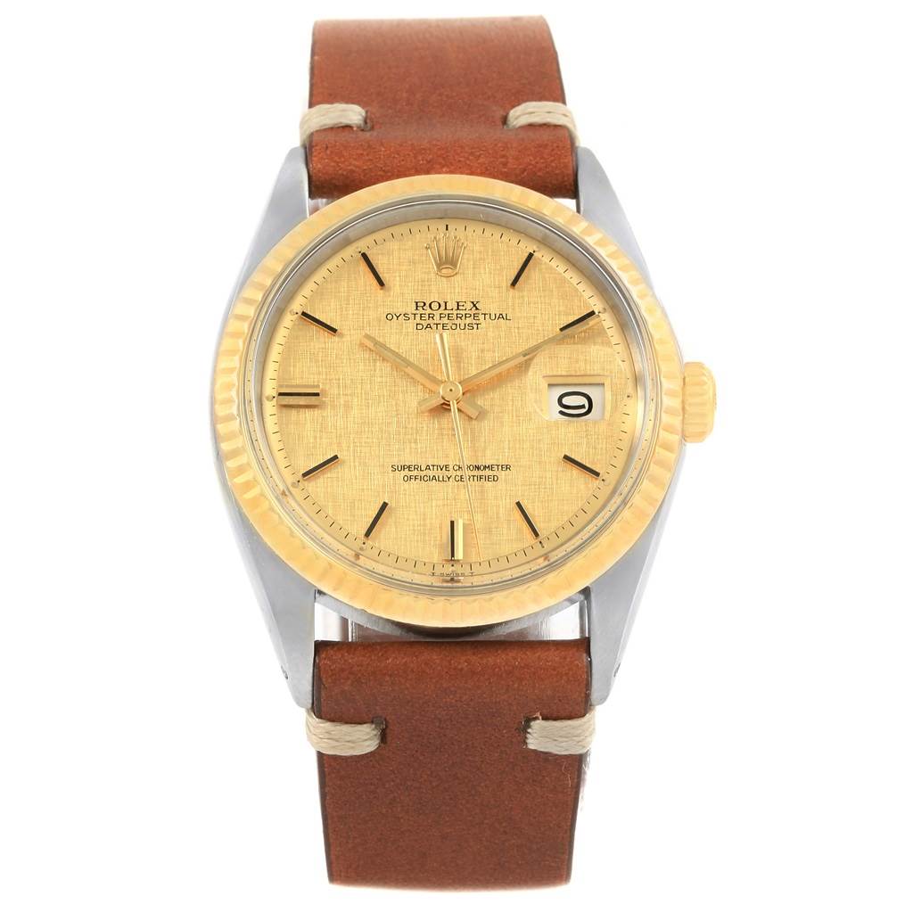 The Rolex Vintage Collection 1601 Men's Steel and Gold (two tone) Champagne Dial 1601 Men's Steel and Gold (two tone) Champagne Dial watch is shown from the front angle, highlighting its face, bezel, crown, and leather strap.