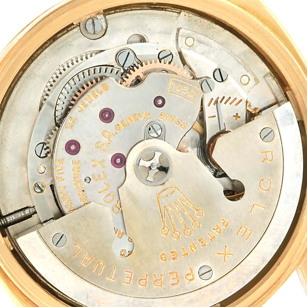 This is a detailed internal view of the Rolex Vintage Collection 6537 Men's Yellow Gold Champagne Dial 6537 Men's Yellow Gold Champagne Dial watch, showing its movement and intricate components.