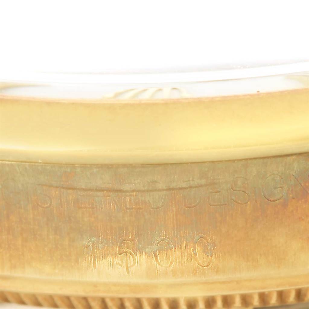 This image shows a close-up view of the side casing and model number "1500" of a Rolex Vintage Collection 1500 Men's Yellow Gold White Dial 1500 Men's Yellow Gold White Dial watch.