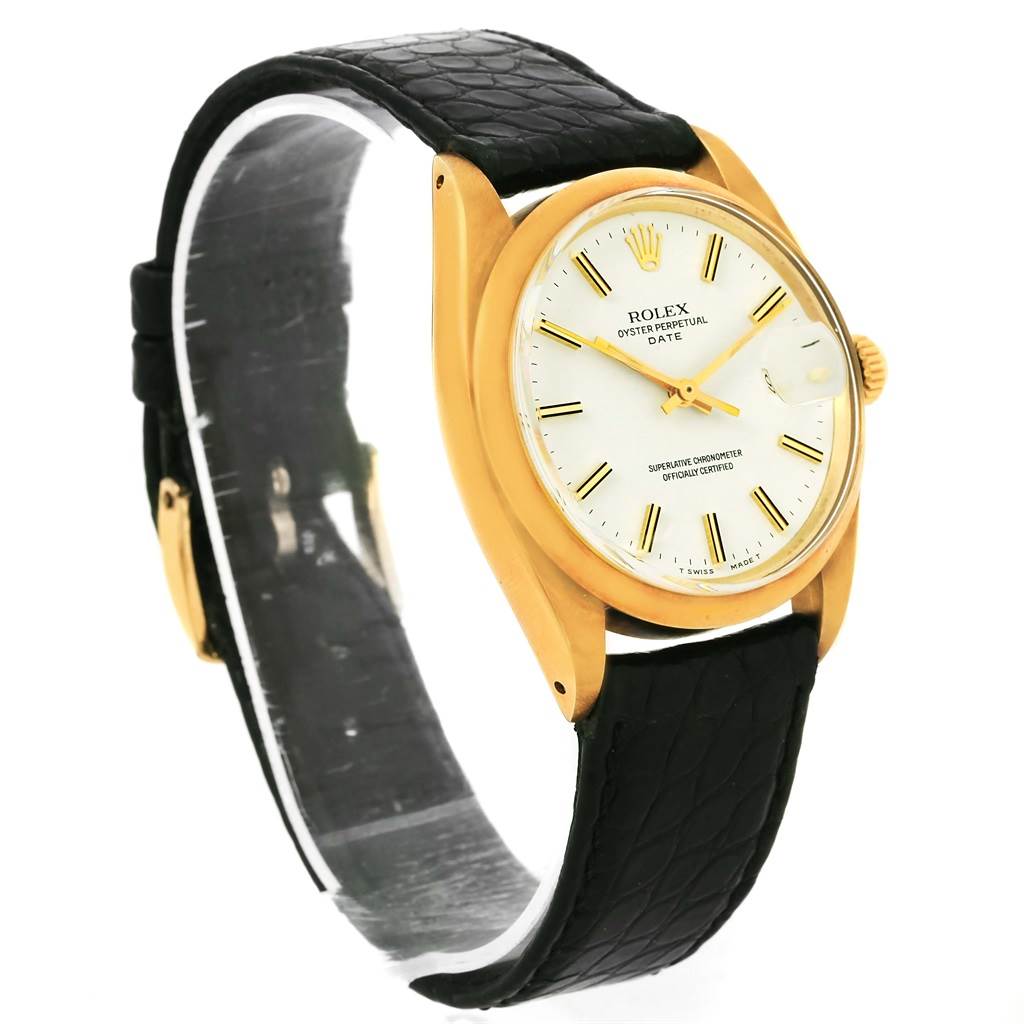 This image shows a side-angle view of a Vintage Collection Rolex watch, highlighting the dial, crown, and leather strap.