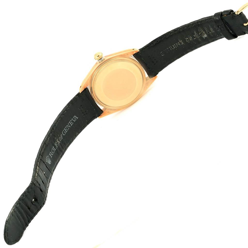 The image shows the back case and leather strap of a Rolex Vintage Collection 1500 Men's Yellow Gold White Dial 1500 Men's Yellow Gold White Dial watch, viewed from the bottom side.