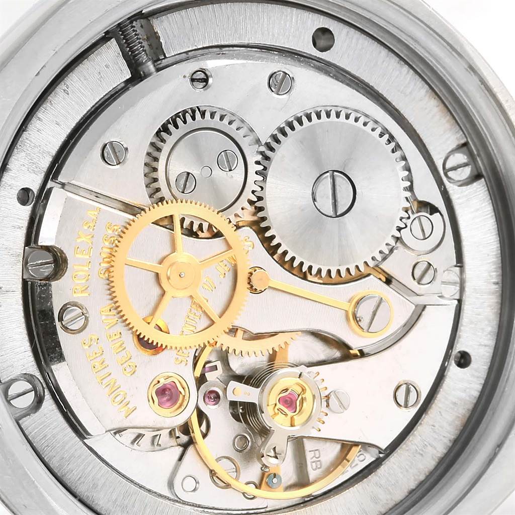 The image shows the intricate inner mechanical movement of a Rolex Vintage Collection 6694 Men's Stainless Steel Blue Dial 6694 Men's Stainless Steel Blue Dial watch.