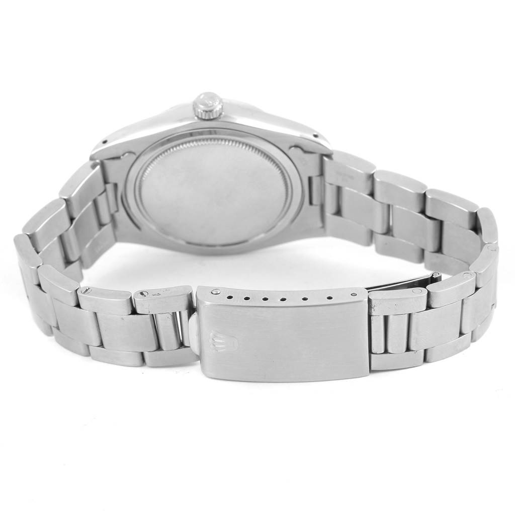 The image shows the backside and bracelet of the Rolex Vintage Collection 6694 Men's Stainless Steel Blue Dial 6694 Men's Stainless Steel Blue Dial watch laid flat.