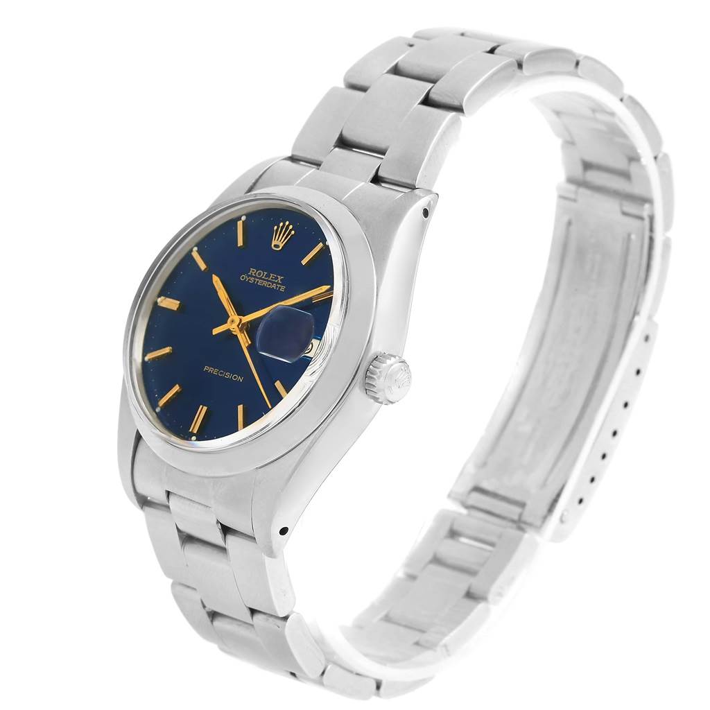 The Rolex Vintage Collection 6694 Men's Stainless Steel Blue Dial 6694 Men's Stainless Steel Blue Dial watch is shown at a three-quarter angle, displaying the face, bracelet, and crown.