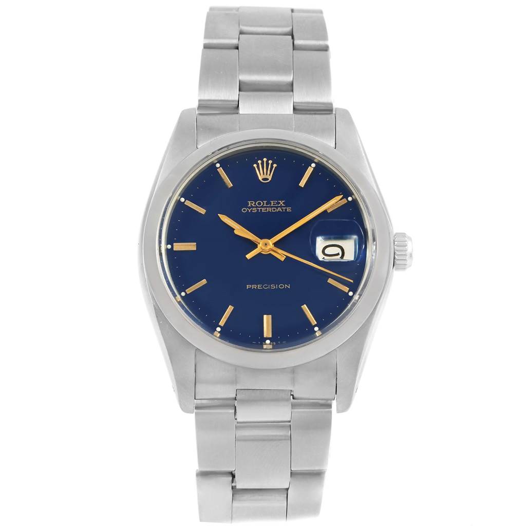 The Rolex Vintage Collection 6694 Men's Stainless Steel Blue Dial 6694 Men's Stainless Steel Blue Dial watch is shown from a front angle, displaying its blue dial, metal bracelet, and magnified date window.