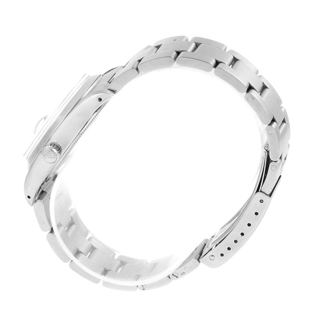 This image shows a side view of a Rolex Vintage Collection 6694 Men's Stainless Steel Blue Dial 6694 Men's Stainless Steel Blue Dial model watch, highlighting the bracelet and crown.