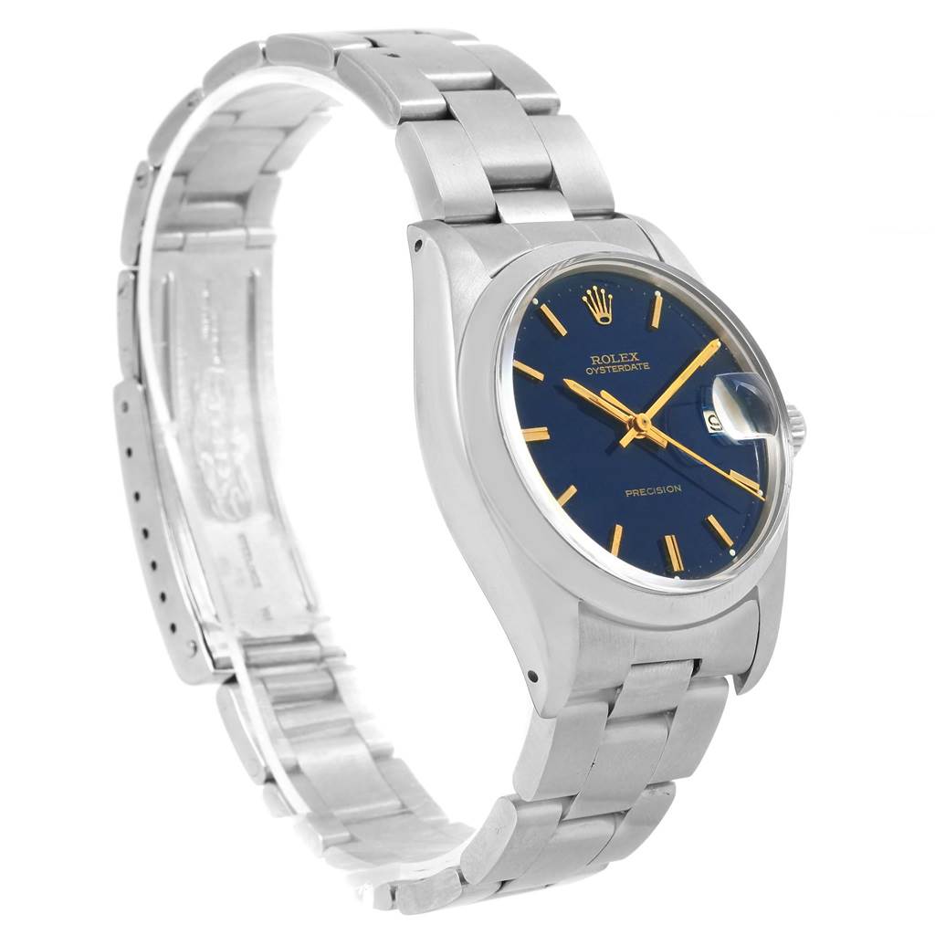 This image shows a side angle of a Rolex Vintage Collection 6694 Men's Stainless Steel Blue Dial 6694 Men's Stainless Steel Blue Dial watch featuring its blue dial, silver case, and metal bracelet.