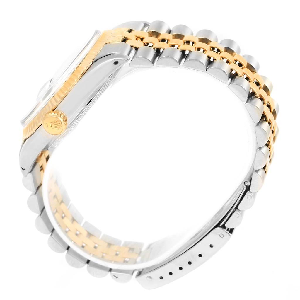 The image shows a side view of a Vintage Collection Rolex watch, highlighting the crown and two-tone bracelet.