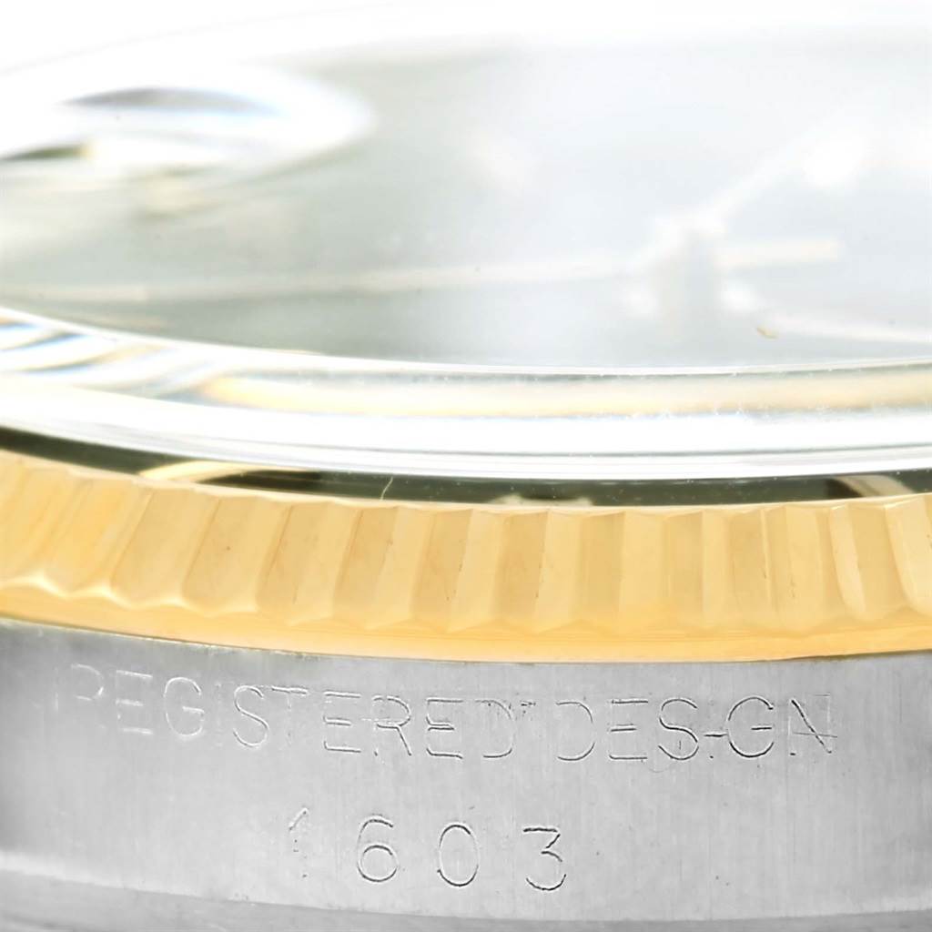 Close-up side view of the bezel and case of a Vintage Collection Rolex watch model 1603.