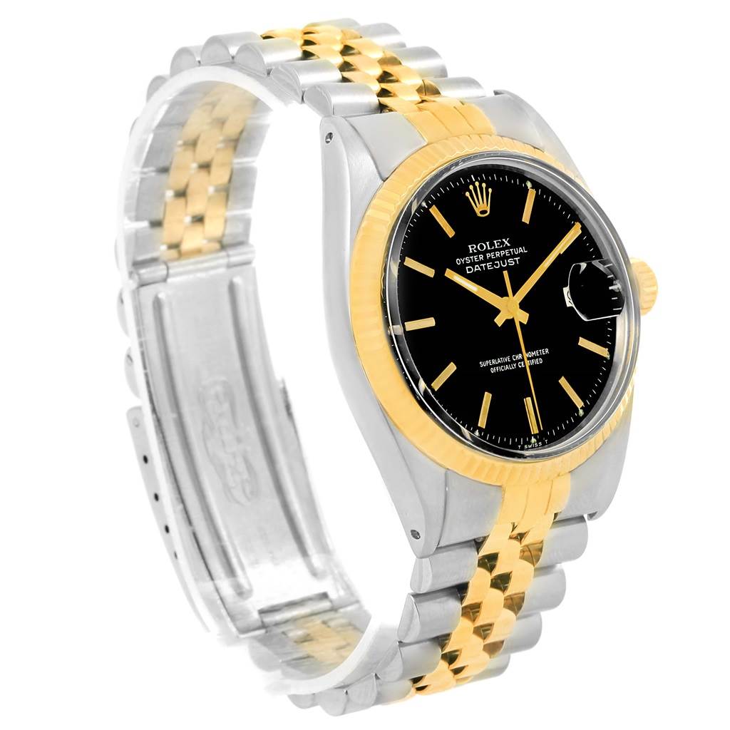 This image shows a Rolex Vintage Collection 1603 Men's Steel and Gold (two tone) Black Dial 1603 Men's Steel and Gold (two tone) Black Dial Datejust watch at a slight side angle, showcasing the face, bezel, bracelet, and clasp.